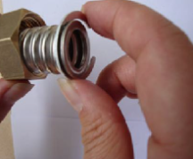 Squeeze the stainless steel Cir-clip on the Solar Hose